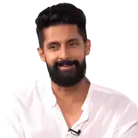 a man with a beard is wearing a white shirt