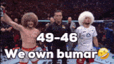 two fighters are standing next to each other with the words we own bumar written on the bottom