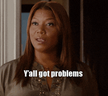 a woman says " y'all got problems " while standing in front of a door