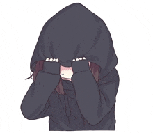 a girl wearing a black hoodie is covering her face with her hands .