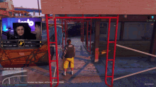 a screenshot of a video game with a man standing in front of a scaffolding