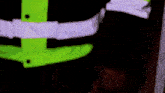 a person wearing a black and white jacket with a neon yellow stripe on the sleeves