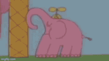 a pink elephant with a propeller on its head is standing next to a fence .