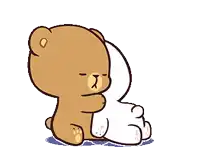 a brown teddy bear and a white teddy bear are standing next to each other .