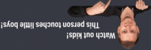 a man laying upside down with the words " this person touches little boys " on the bottom