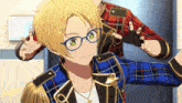 a boy wearing glasses and a plaid shirt has the letter a on his chest
