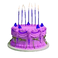 a purple birthday cake with blue frosting and candles on it