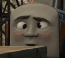 a close up of a cartoon character 's face with a surprised look on it .