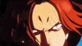 a close up of a person with red hair