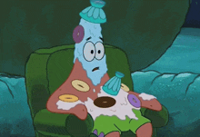 patrick star from spongebob is sitting in a chair with donuts on his face