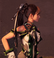 a woman with a ponytail is wearing a green and silver outfit