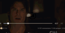a close up of a man 's face in the dark
