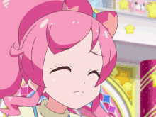a girl with pink hair is making a sad face with her eyes closed