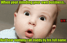 a baby with a surprised look on his face and a caption that says when your minding your own business