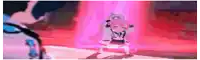 a girl with pink hair is standing on a stage in front of a red light .
