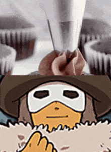 a cartoon of a duck wearing a mask and a cowboy hat