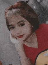 a girl in a red shirt with the words duo chubby meyra & rere written below her