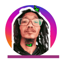 a picture of a man with glasses and dreadlocks