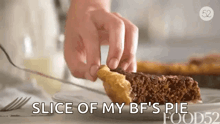 a person is taking a slice of their bf 's pie with a fork .