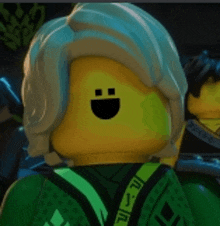 a close up of a lego man with a smiley face on his face .