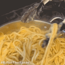 mixing pasta ralphthebaker making pasta cooking carbonara mixing the pasta in the sauce