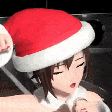 a girl is wearing a santa hat and holding a microphone .