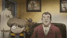 a man in a suit and bow tie is sitting next to a cartoon character .