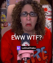 a woman with curly hair is wearing glasses and a hello kitty sweater