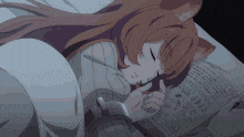 a girl with fox ears is sleeping in a bed