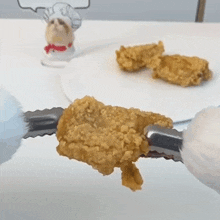Pulling Out The Bones That Little Puff GIF - Pulling Out The Bones That Little Puff Making Boneless Fried Chicken GIFs