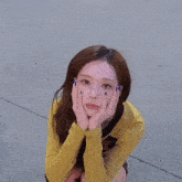 a woman wearing a yellow shirt with the number 3 on it is smiling