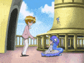 a boy and a girl are standing next to each other in front of a tower