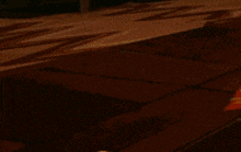a cartoon character with a mustache is standing on a sidewalk