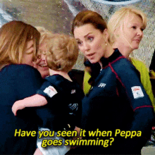 a group of women holding a child with the caption " have you seen it when peppa goes swimming "