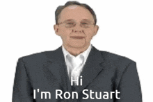 a man in a suit and glasses is saying hi i 'm ron stuart