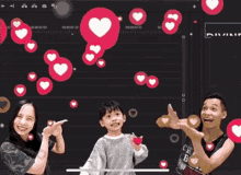 a man and a woman standing next to a little girl with hearts coming out of them