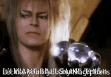 a woman is holding a glass ball in her hand and says `` it 's like your balls but with expectations '' .