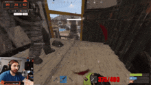 a man is playing a video game with 375/400 in the lower right corner