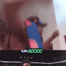 a blurred image of a person standing in front of a sign that says noooo