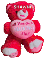 a red teddy bear that says happy valentine 's day on it
