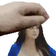 a hand is holding a woman 's head in a pixel art .