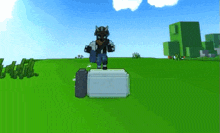 a video game character is standing on a white box in a grassy field