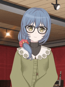 a girl with blue hair wearing glasses and a sweater