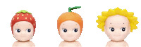 three dolls with strawberries oranges and a sunflower on their head