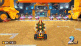 a video game is being played on a nintendo wii and a car is driving down a track .