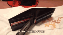 an empty wallet with the words " if i had superpowers " written below it