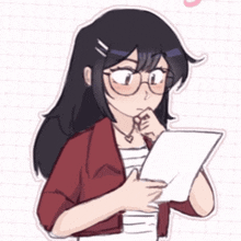 a girl with glasses is holding a piece of paper in her hand