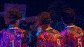 a man wearing a jersey that says something on the back