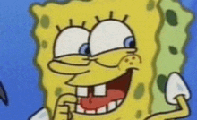 a close up of spongebob squarepants ' face on a blue background