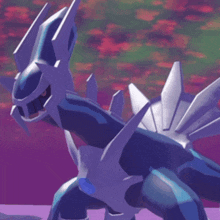 a purple and blue pokemon with a purple sky behind it